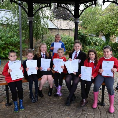 Children show letters they've written to Fenland District Council - Photograph by Rob Morris