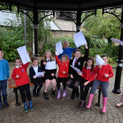Children show letters they've written to Fenland District Council - Photograph by Rob Morris